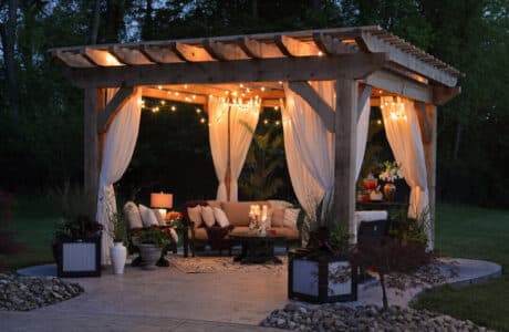 Outdoor patio with pergola and lighting
